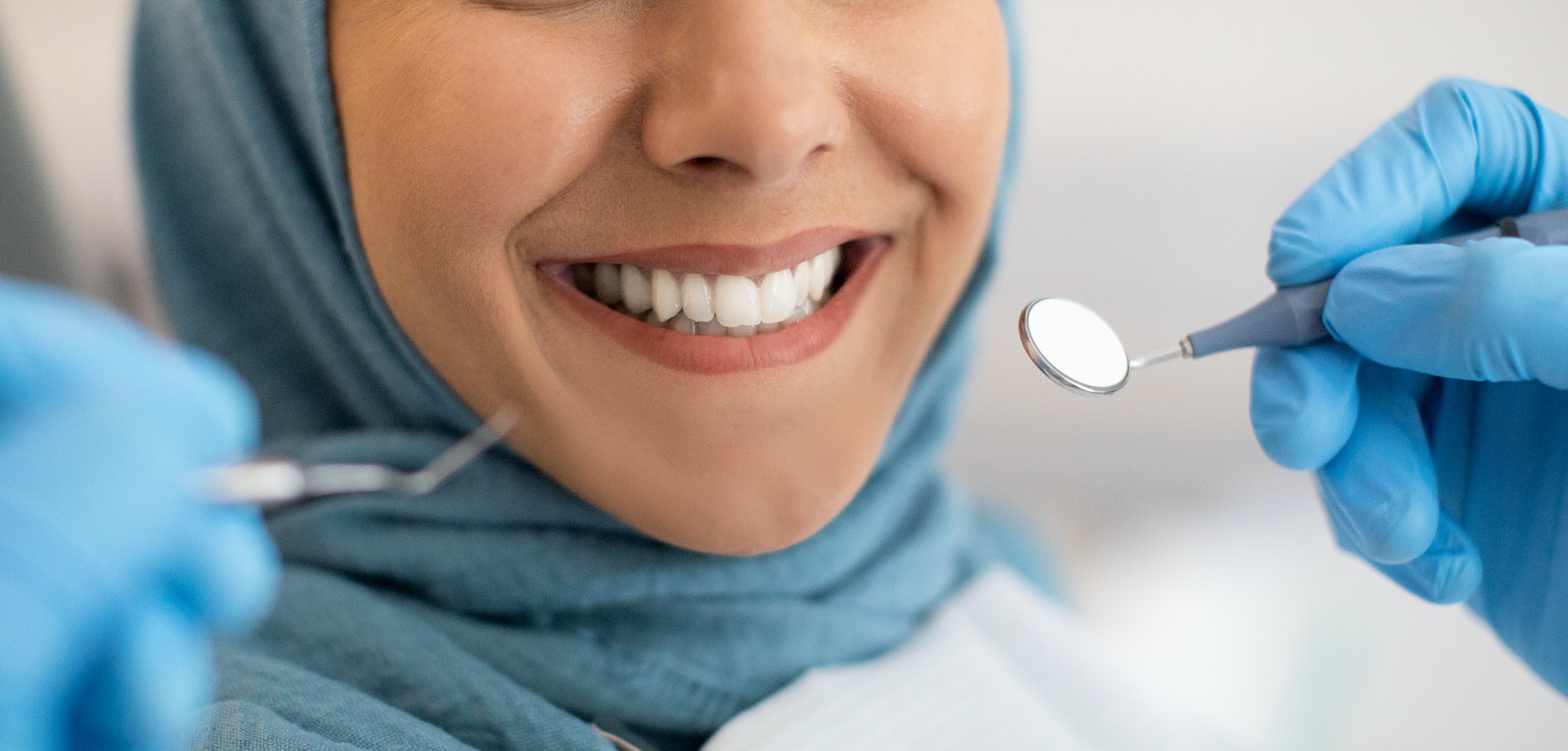 Smile Makeover. Closeup Of Smiling Woman In Hijab During Dental Check Up
